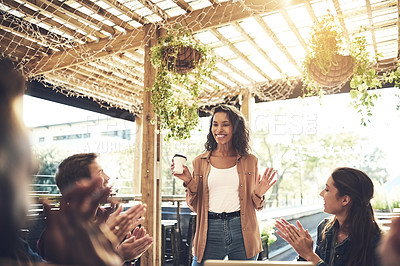 Buy stock photo Shot of creative employees having a breakfast meeting outside