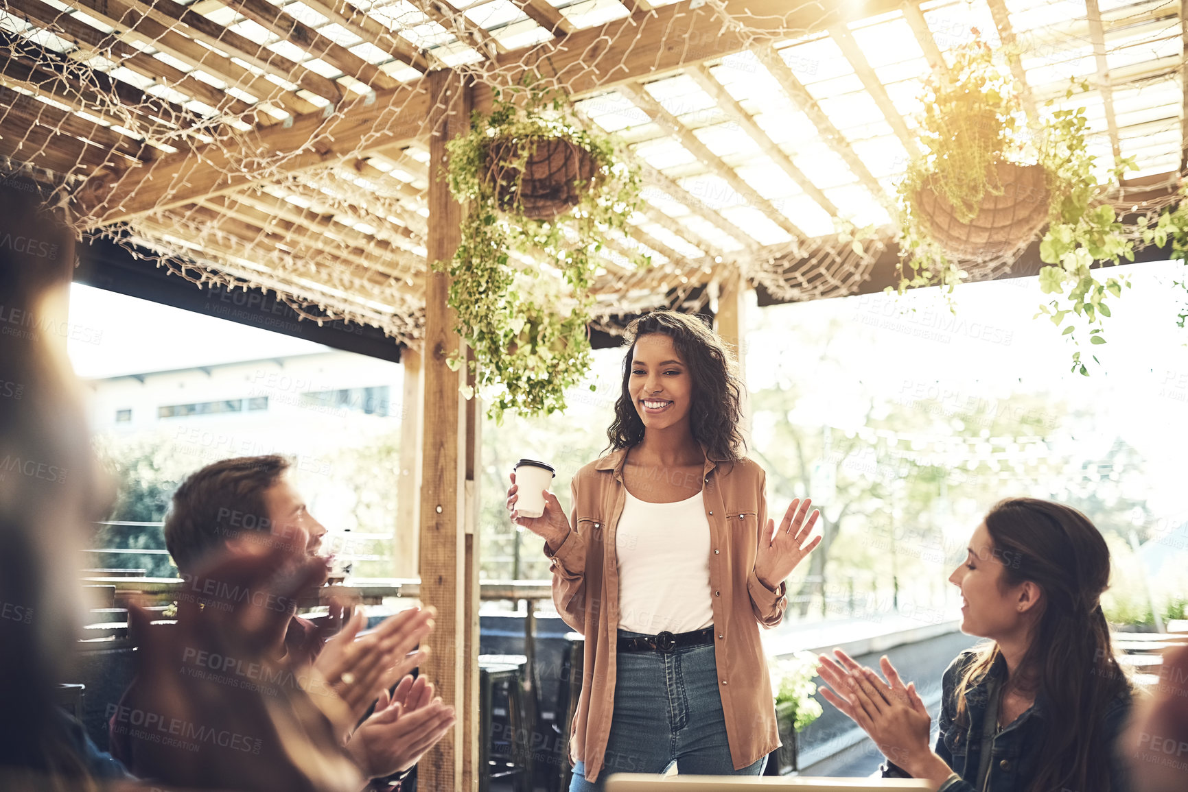 Buy stock photo Happy woman, coffee and presentation with colleagues or applause for meeting or discussion at cafe. Young female person with group of employees clapping for promotion or team building at coffee shop