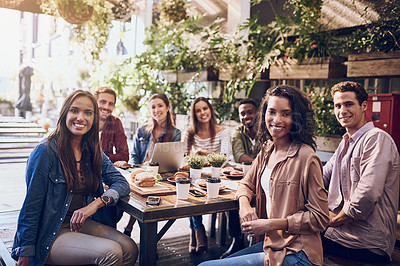 Buy stock photo Shot of a group of friends out for lunch at a cafe