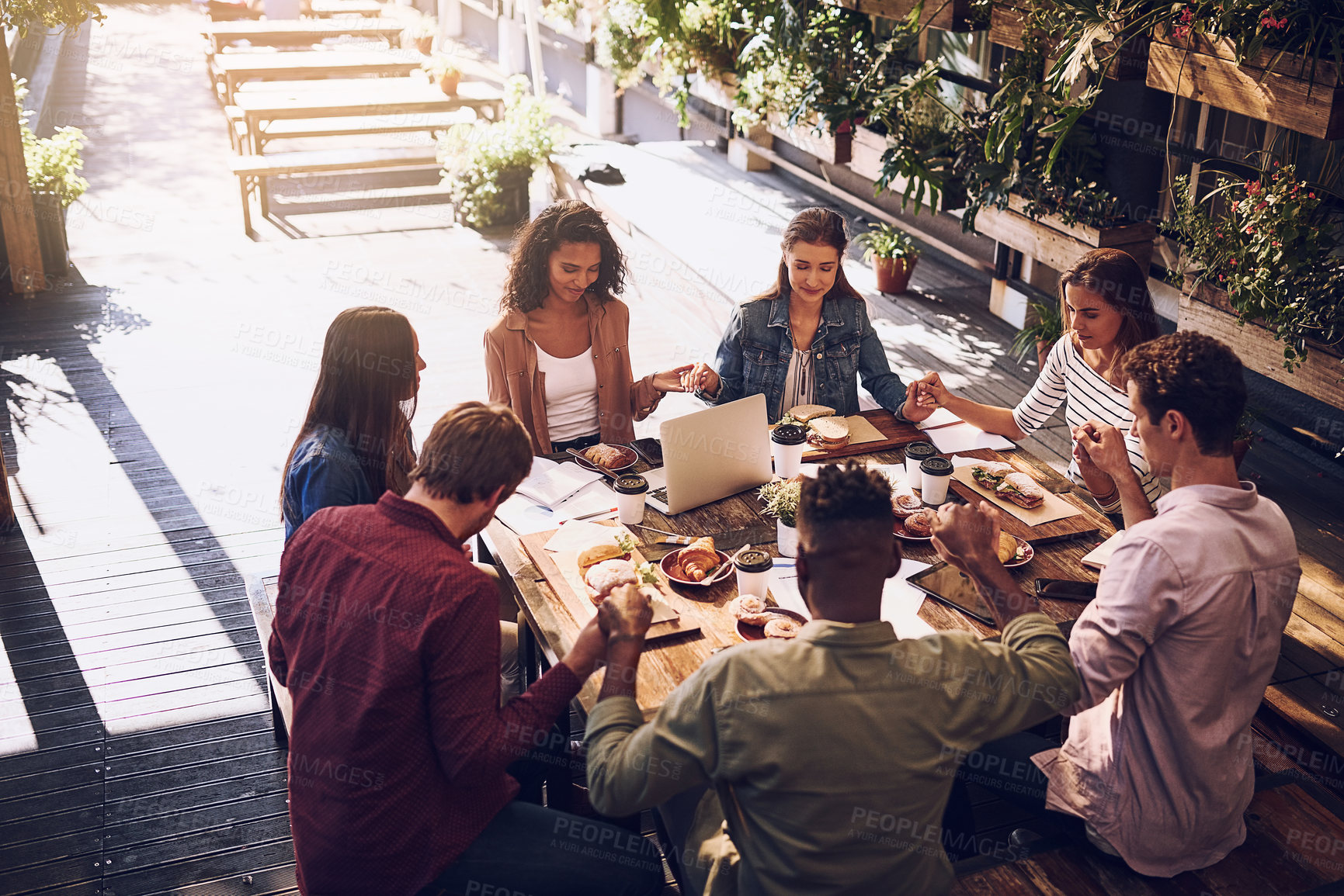 Buy stock photo Prayer, group and people holding hands for food, finance planning and budget documents of teamwork. Staff, thanks and meeting respect with paperwork, graphs and profit for accounting at cafe together