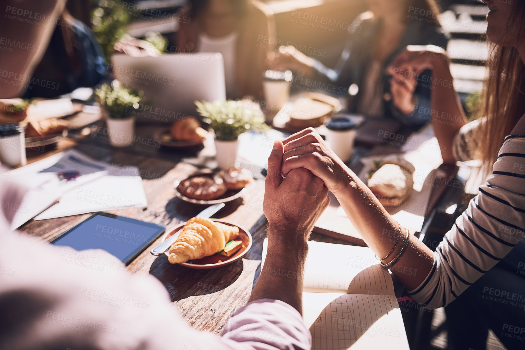 Buy stock photo Holding hands, people and respect with prayer for food, finance planning and budget documents of teamwork. Staff, thanks and meeting with paperwork, graphs and profit stats for kpi accounting at cafe