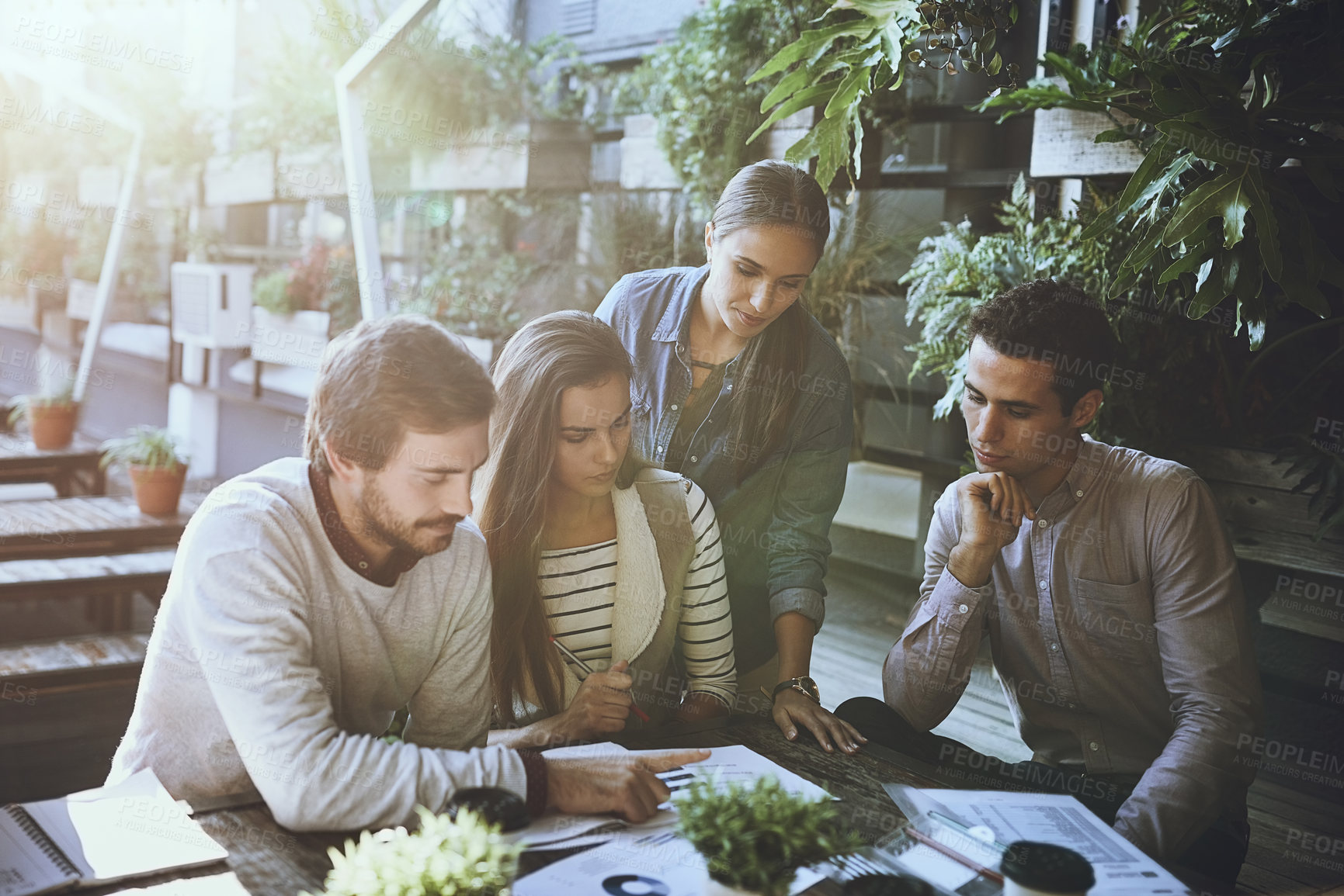 Buy stock photo Group, cafe and business meeting with documents, reading and diversity of employees, plants and outdoor. Stats, colleagues and discussion of graph, paperwork and teamwork of SEO specialist and people