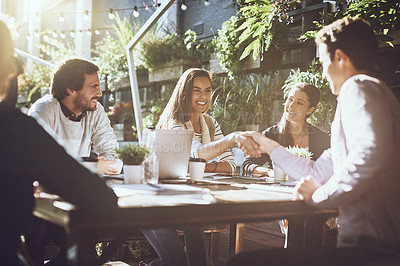 Buy stock photo Handshake, partnership and group of people at coffee shop with agreement by contract for business meeting. Shaking hands, trust and welcome with employee for recruitment or deal by collaboration