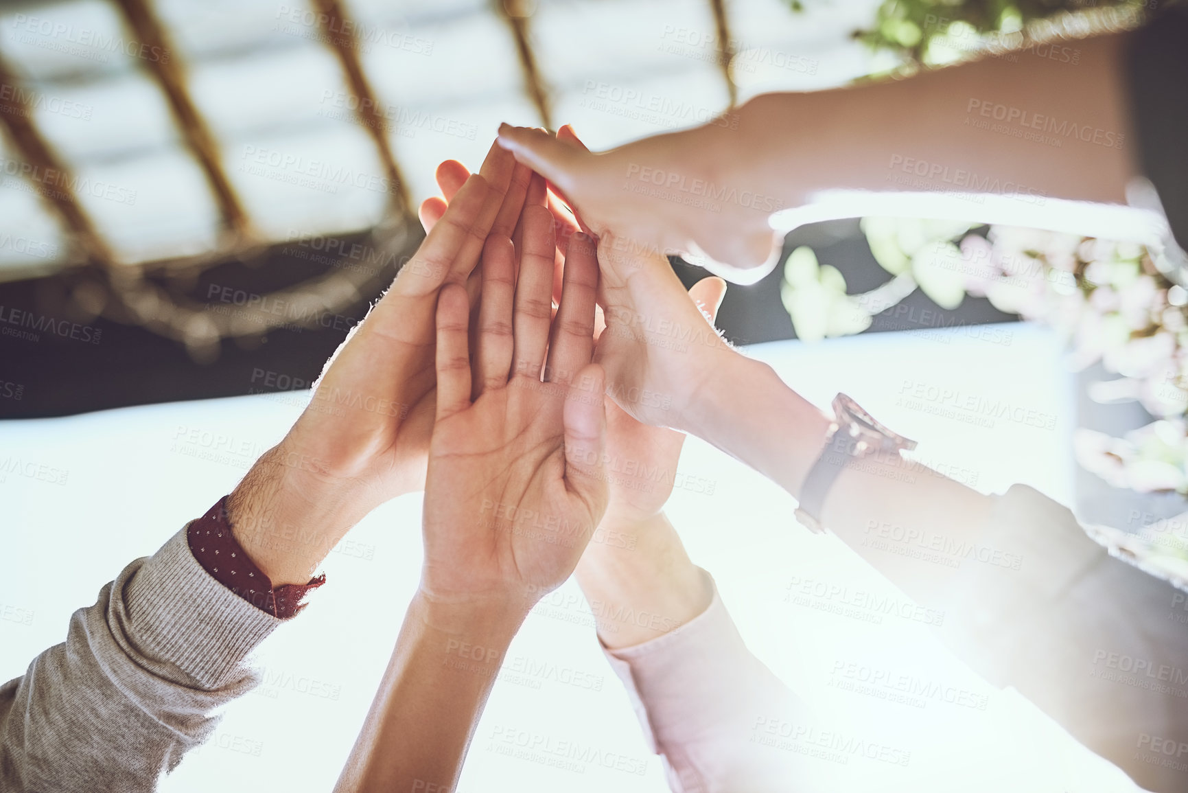 Buy stock photo Business people, hands and high five for teamwork, success or winning in unity or collaboration outdoors. Group touching hand in agreement, meeting or team building in win together at the workplace