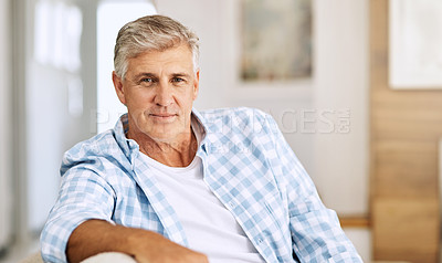 Buy stock photo Cropped shot of a mature man relaxing on his sofa at home