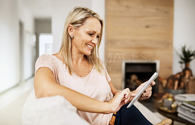 Buy stock photo Woman, touch and tablet on sofa for social media, scroll and ebook online on couch. Technology, internet and search on digital website in home, female person an living room for relax and network
