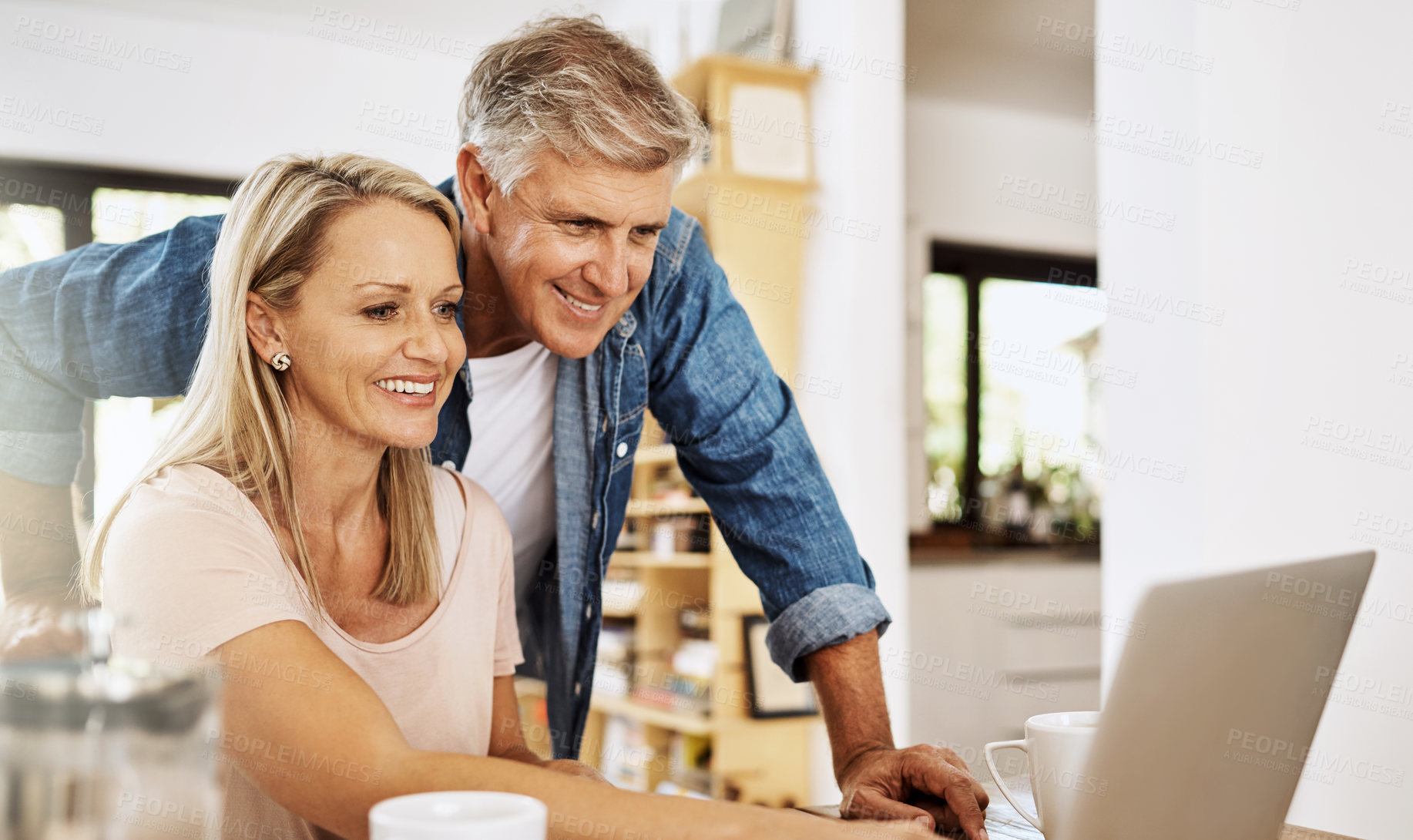 Buy stock photo Mature couple, smile and laptop research at home with happiness and computer. Email, online banking and life insurance of a woman and man together in a house planning finance budget for retirement 