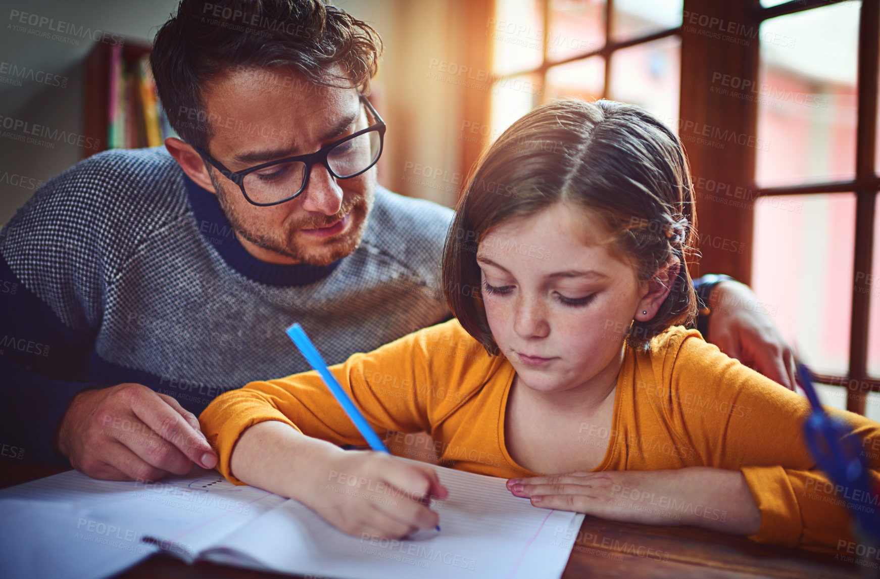 Buy stock photo Homework, learning and dad helping child with studying for private school admission exam. Scholarship, education and father with girl kid student reading, writing and preparing for test in house.