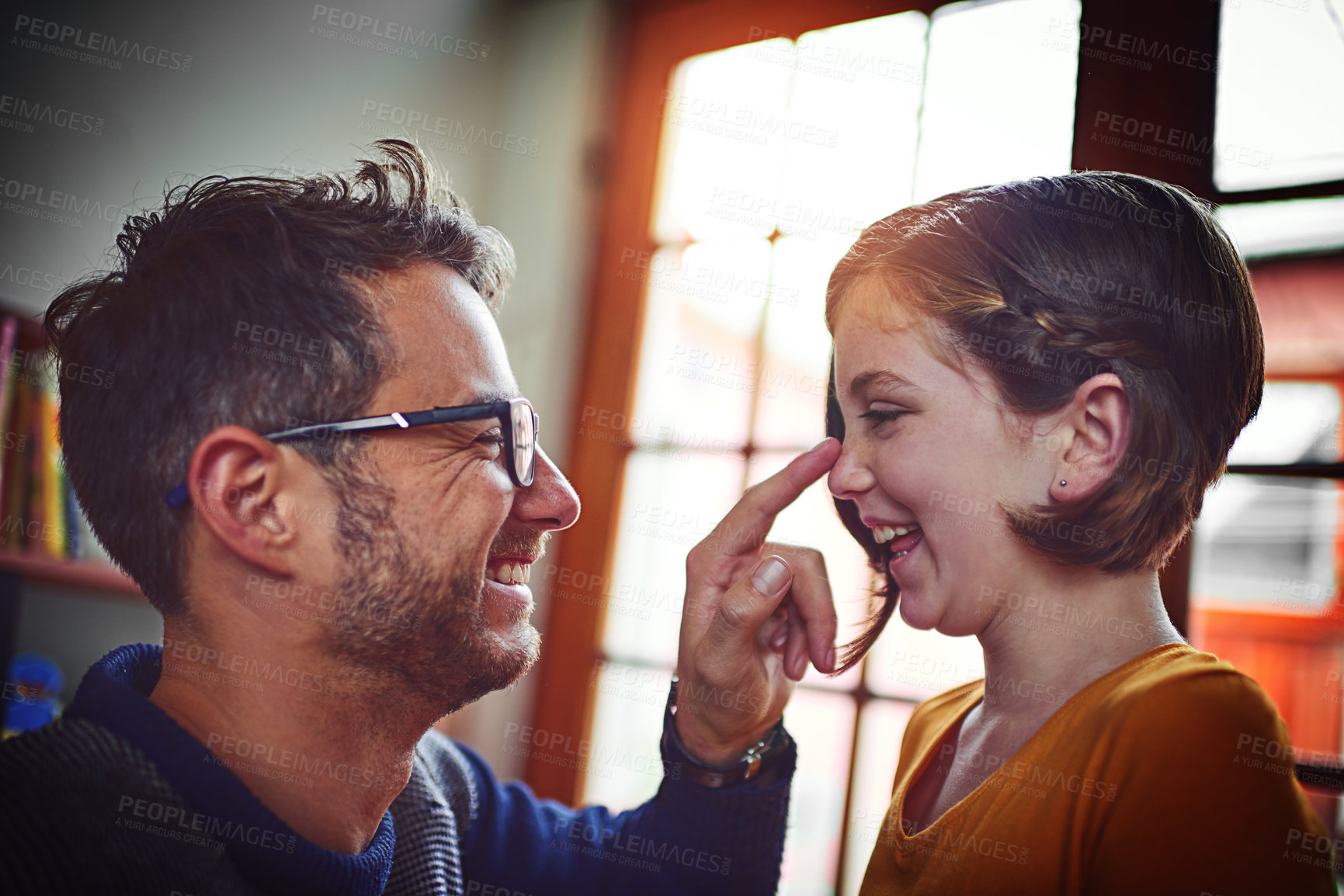 Buy stock photo Father, girl and touch nose with play, laugh and excited with game, profile and connection in family home. Man, dad and child with comic memory, care and love with bonding in morning at apartment