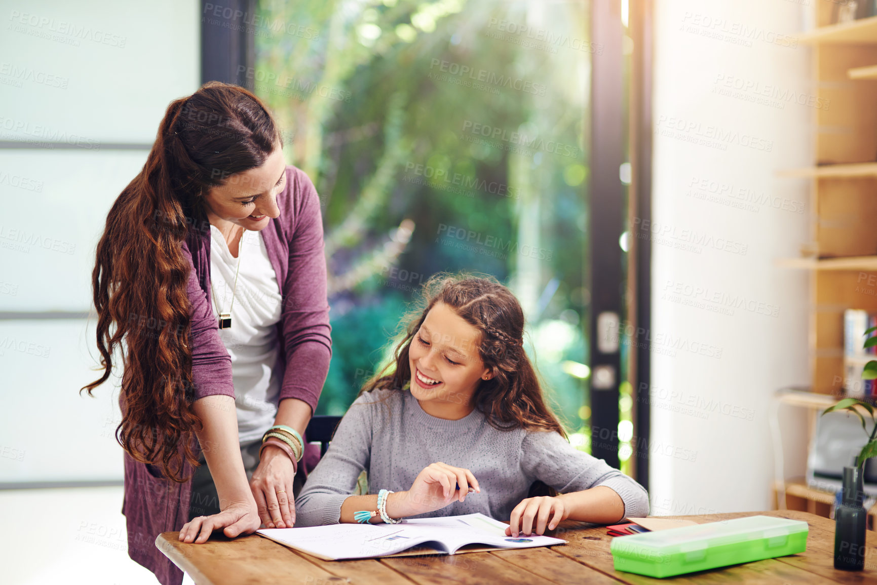 Buy stock photo Happy mother, child and help with homework for education, studying and knowledge in home school. Girl, mom and teaching kid reading book for learning, development and support for project in lesson