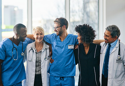 Buy stock photo Portrait of a diverse team of doctors standing together in a hospital