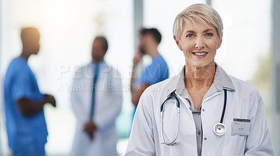 Buy stock photo Portrait of a happy mature woman working as a doctor in a hospital