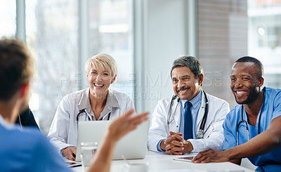 Buy stock photo Unity, teamwork and happy health care workers having a meeting in a conference room. Diverse doctors discussing modern treatments and innovation, brainstorming to find a cure for sickness and disease
