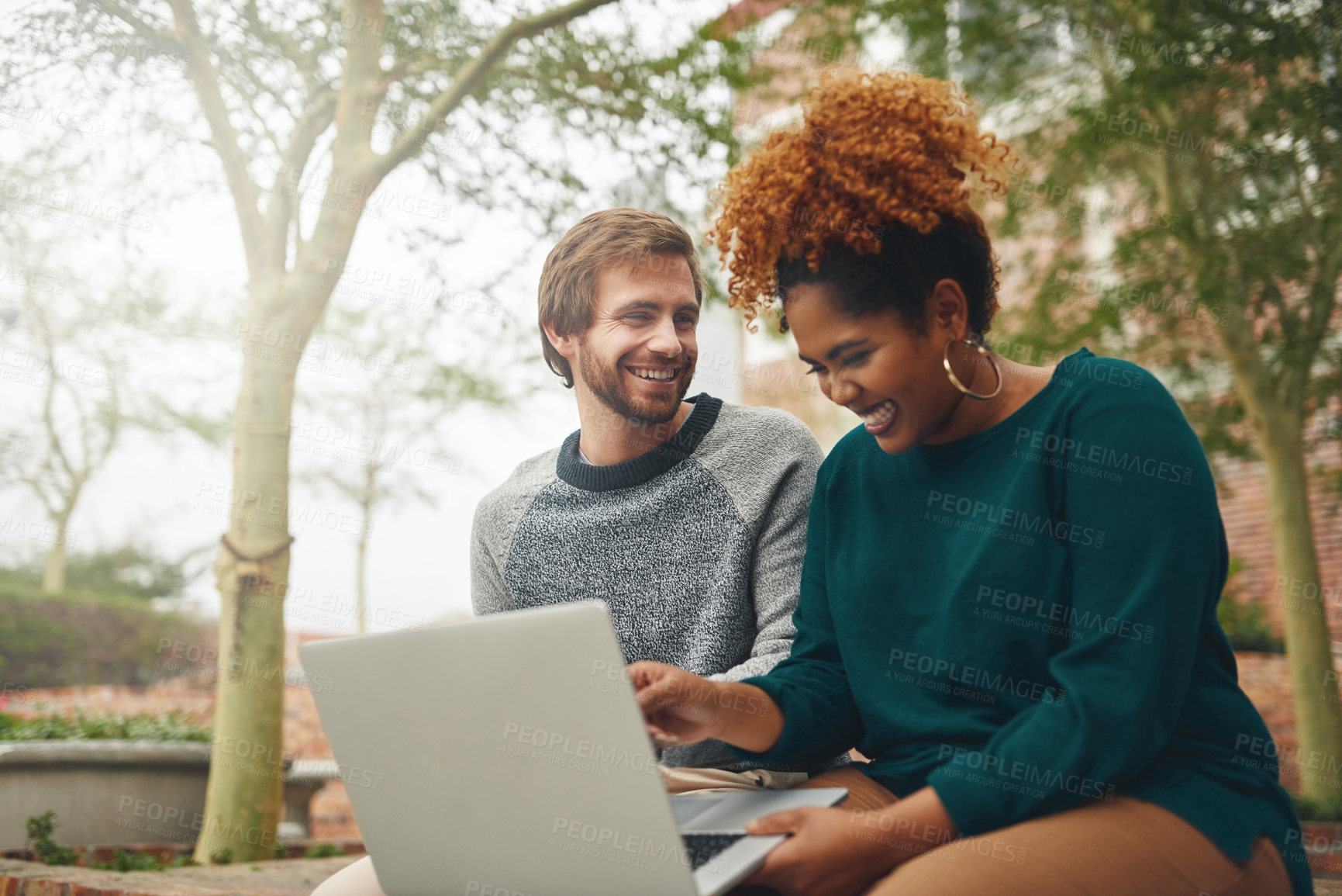 Buy stock photo Students, relax and outdoor with laughter or laptop for academic teamwork, research and study for assignment. Friends, happy and online in university garden for education, communication and task.