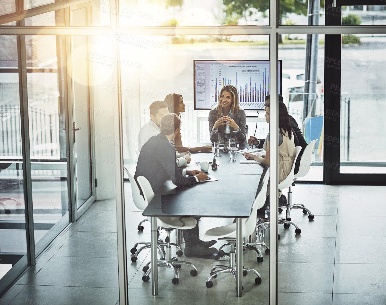 Buy stock photo Shot of corporate businesspeople meeting in the boardroom