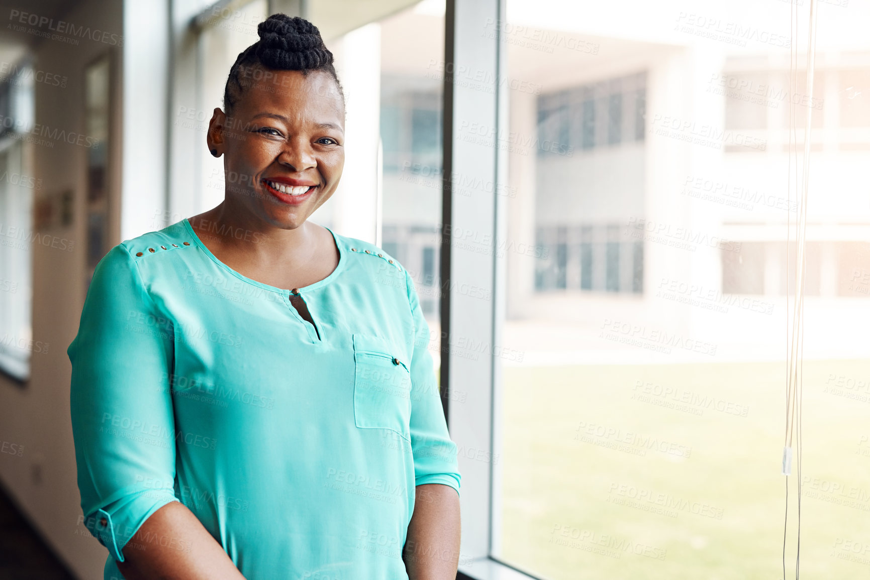 Buy stock photo Portrait of a successful mature businesswoman working in an office