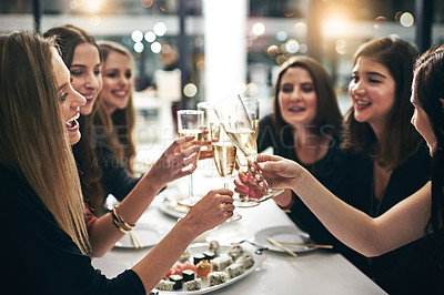 Buy stock photo Women, friends and celebration with champagne in restaurant for toast, sushi and dinner together. Female people, party and sparkling wine for cheers, happiness and fine dining for girls night out