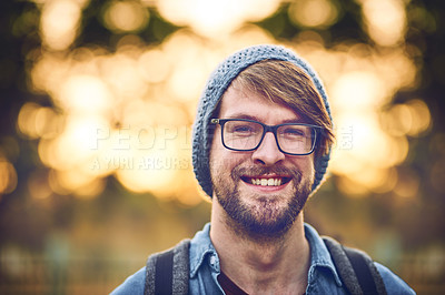 Buy stock photo Cropped shot of a handsome young man outdoors during fall