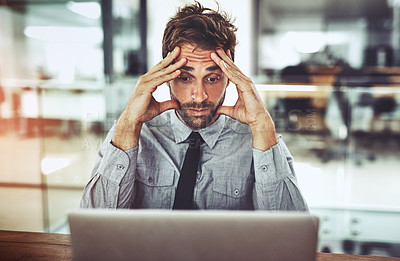 Buy stock photo Businessman, laptop and headache in stress, anxiety or burnout from debt at the office desk. Frustrated man person or employee with bad head pain or confused working on computer at the workplace