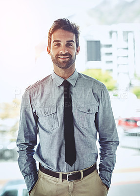 Buy stock photo Portrait, confident and businessman in office by window as project manager with pride, joy and ambition for startup business. Happy, male person and Italian employee with comfort on corporate career 