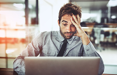 Buy stock photo Businessman, laptop and headache in stress, burnout or overworked from strain at the office desk. Frustrated man person or employee with bad head pain or confused working on computer at the workplace