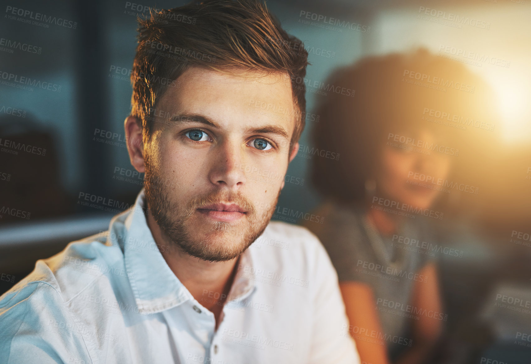 Buy stock photo Man, portrait and team in office at night for management, overwork and determination. Deadline, collaboration and male creator in workplace with partner, serious and professional in industry