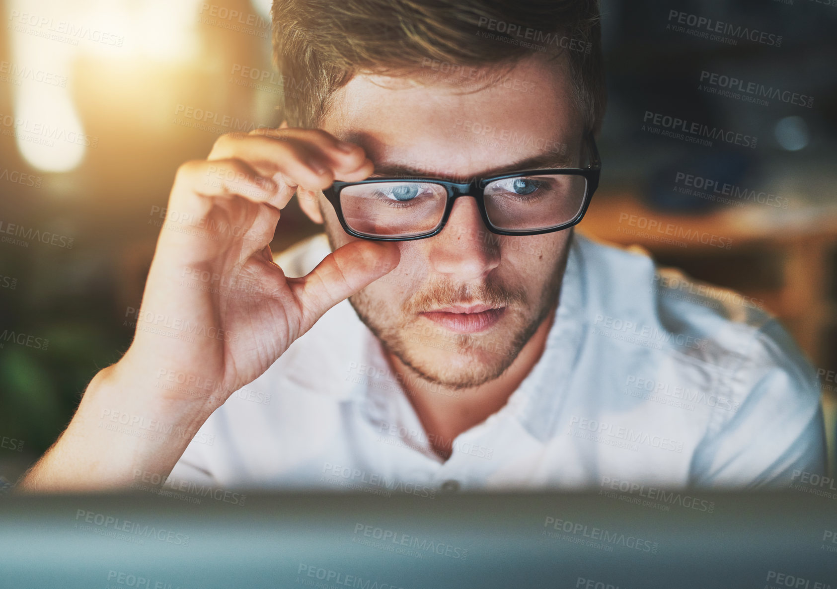 Buy stock photo Man, computer and glasses at night in workplace, research and web designer for proposal. Male person, employee and networking or website for online tasks, project management and reflection in dark