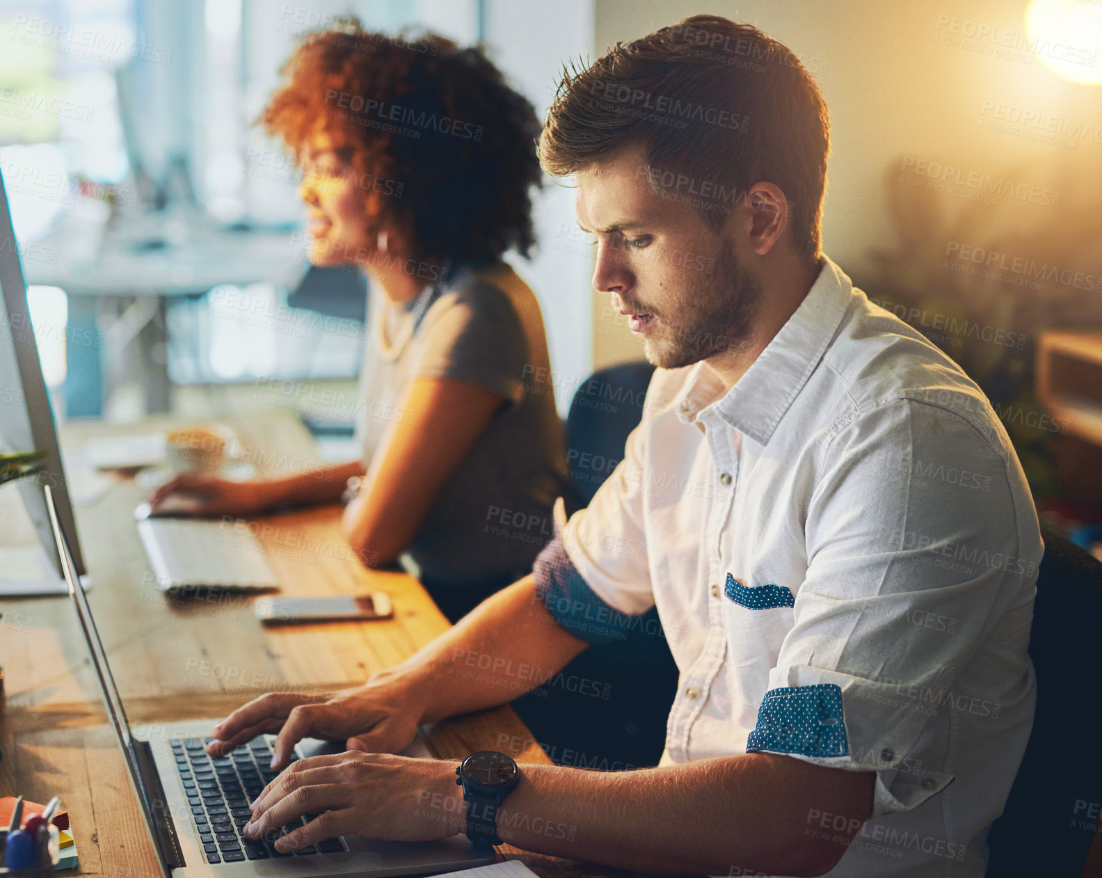 Buy stock photo Teamwork, typing and man in night, laptop and deadline for working late in project. Business, colleagues and partnership for web design, creative and dark in workspace, woman and online in office