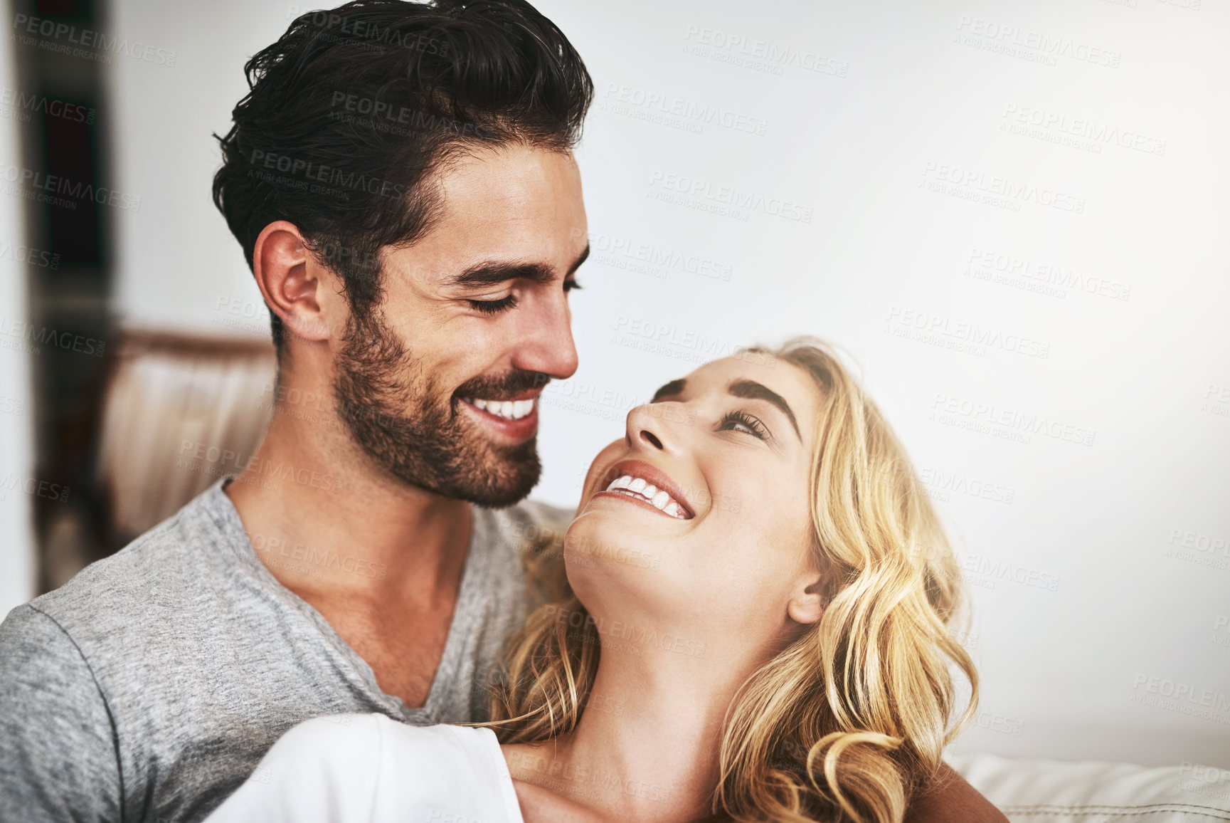 Buy stock photo Shot of a couple relaxing at home