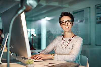 Buy stock photo Shot of a young businesswoman working late at the office