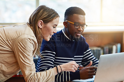 Buy stock photo Students, studying and teamwork in library on computer with education, knowledge or college scholarship. Young people on laptop for research, solution and ideas or planning essay with online learning