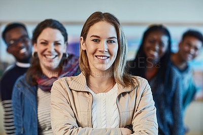 Buy stock photo Portrait of a group of university students standing together at campus
