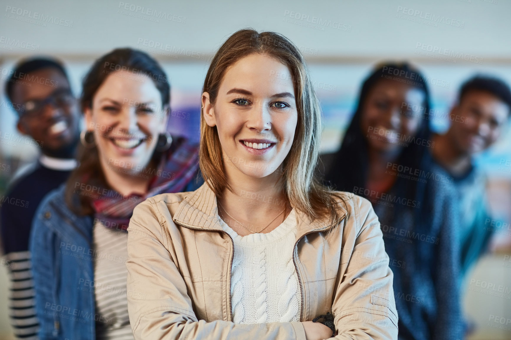 Buy stock photo Portrait of a group of university students standing together at campus