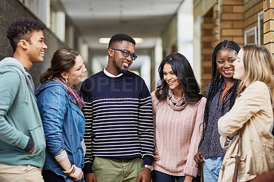 Buy stock photo Shot of a group of university students at campus