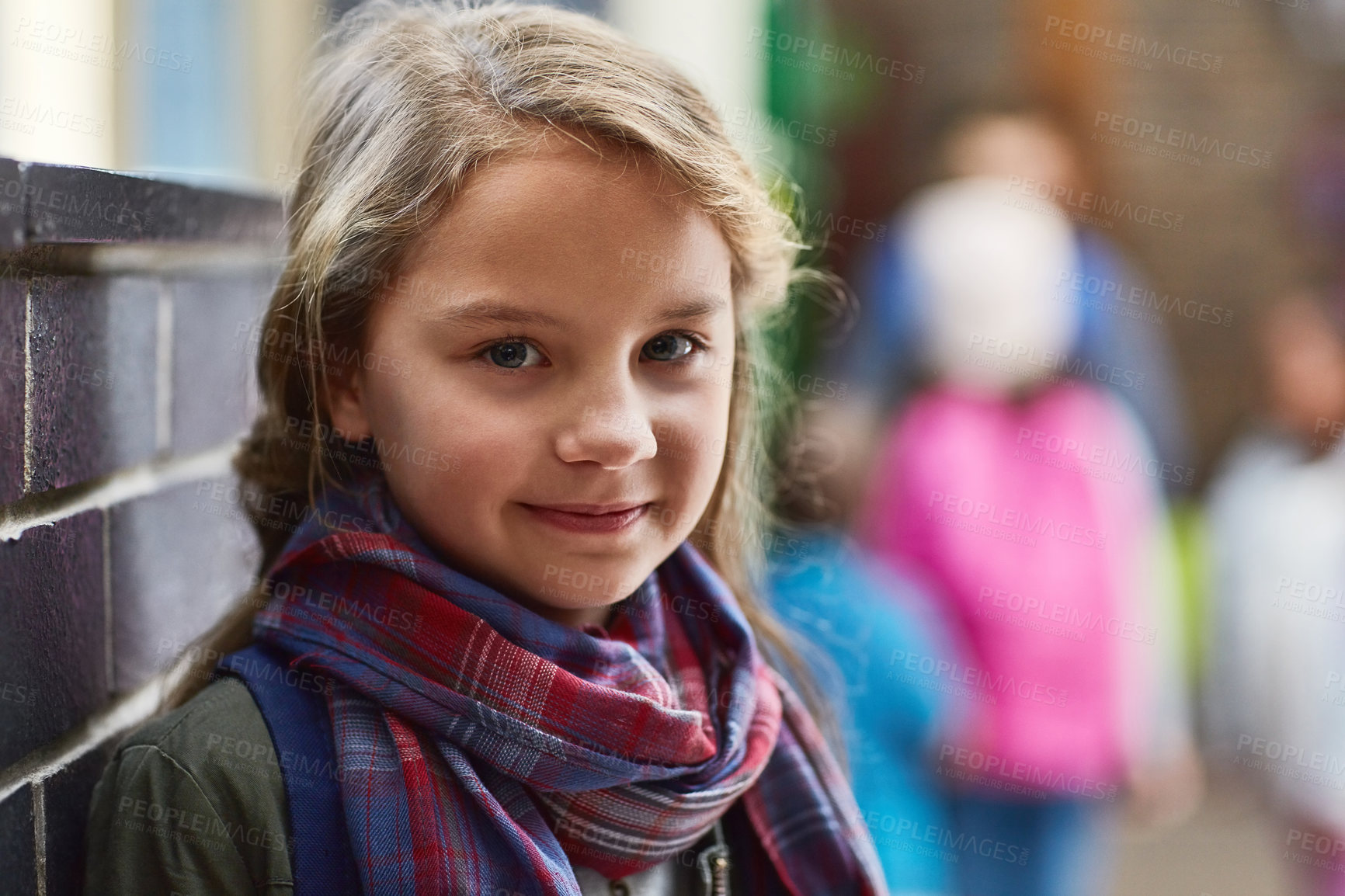 Buy stock photo Cropped shot of an elementary school girl in the corridor at school