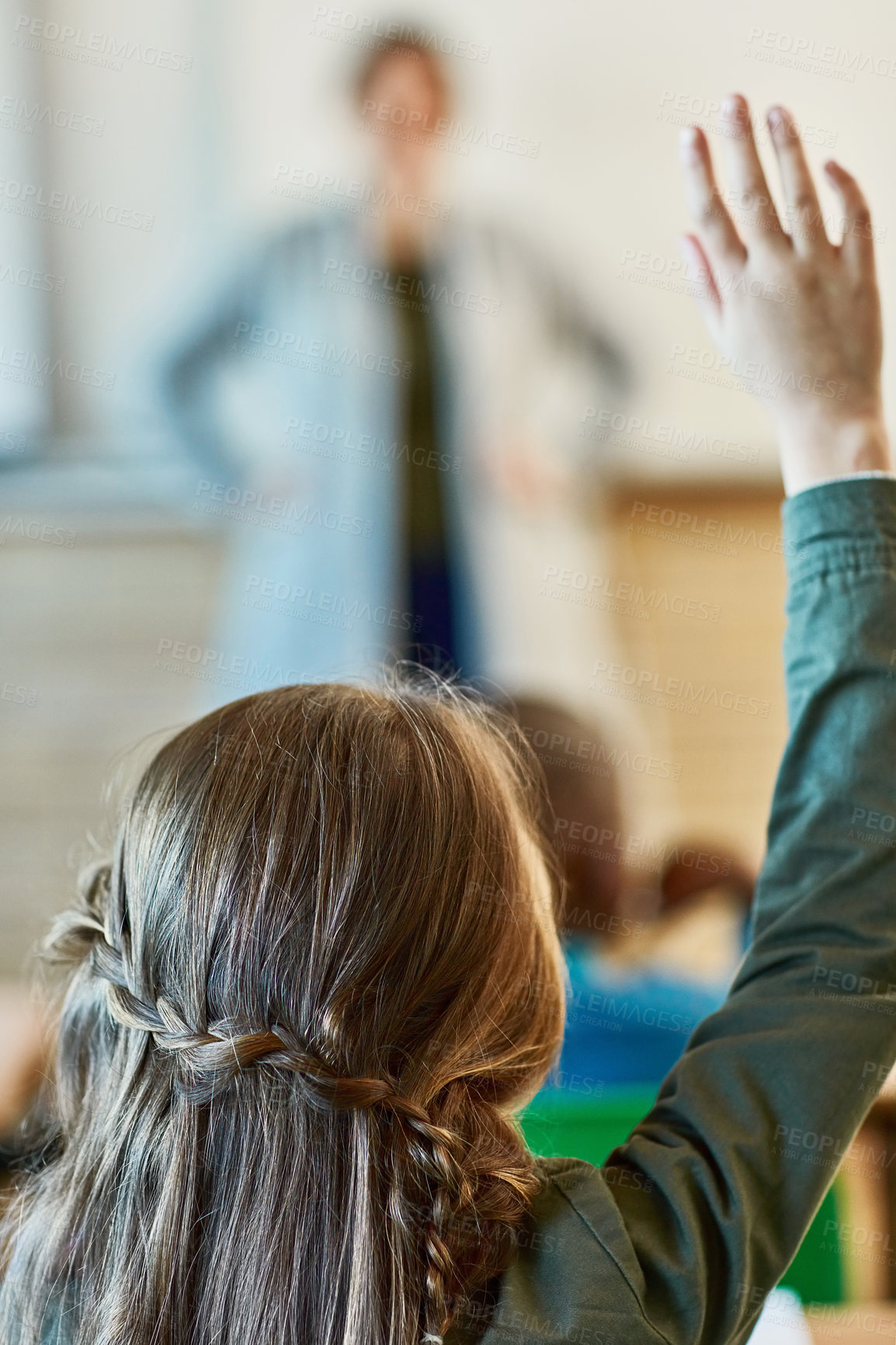 Buy stock photo Girl, student and hand with question for teacher, answer or interaction in classroom at elementary school. Back view, child or kid with enquiry for invigilator or educator in exam, test or assessment