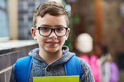 Buy stock photo Cropped shot of an elementary school boy in the corridor at school