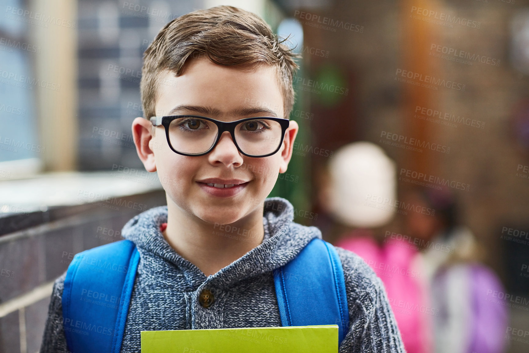 Buy stock photo Cropped shot of an elementary school boy in the corridor at school