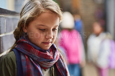 Buy stock photo Cropped shot of an elementary school girl in the corridor at school