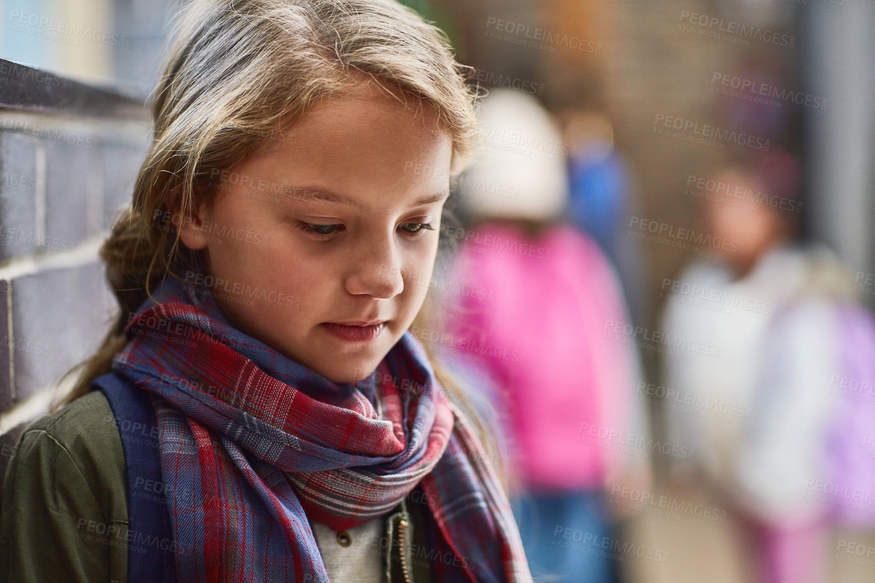 Buy stock photo Depression, lonely and sad with girl student in hallway of school as bully victim or outcast. Upset, stress or thinking and child learner with anxiety for education with abuse or psychology solution