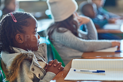 Buy stock photo Cropped shot of elementary school kids being attentive in the classroom
