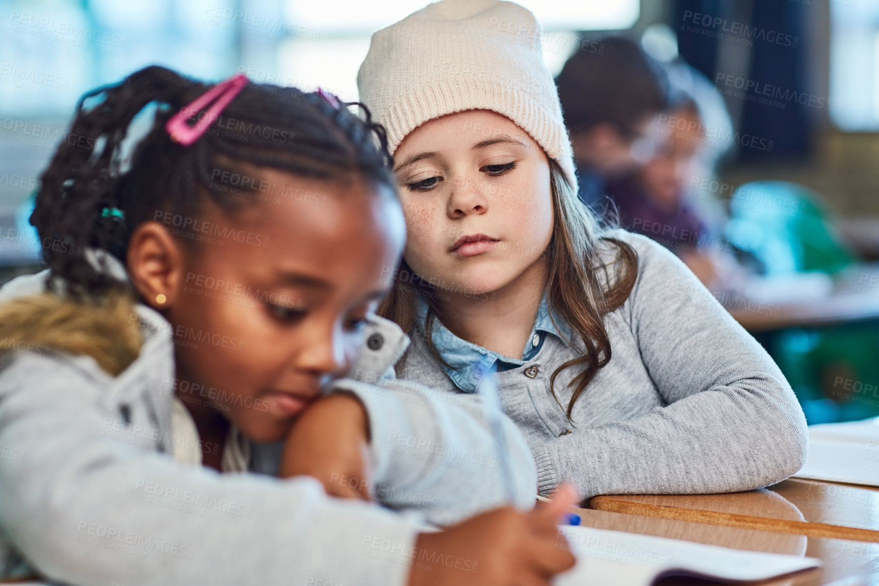 Buy stock photo Little girl, school and writing with book in classroom for learning, education or childhood development. Young children, group or elementary kids taking notes for exam, project or test on knowledge