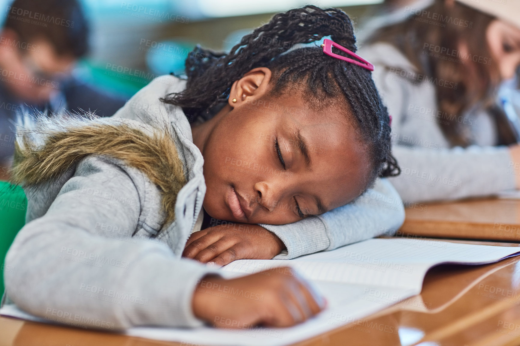 Buy stock photo Black girl, tired and student sleeping in class, bored child and learner dreaming on school desk. Female person, fatigue and burnout for education or learning, exhausted and nap on table at academy