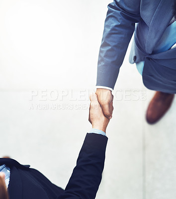 Buy stock photo Handshake, welcome and business men in office with b2b deal, collaboration or agreement. Professional, meeting and aerial view of male lawyers shaking hands for greeting or partnership in workplace.