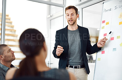 Buy stock photo Businessman, coach and meeting with whiteboard for brainstorming, training staff or schedule planning at office. Man, speaker and talking with employees for discussion on agenda, tasks or project