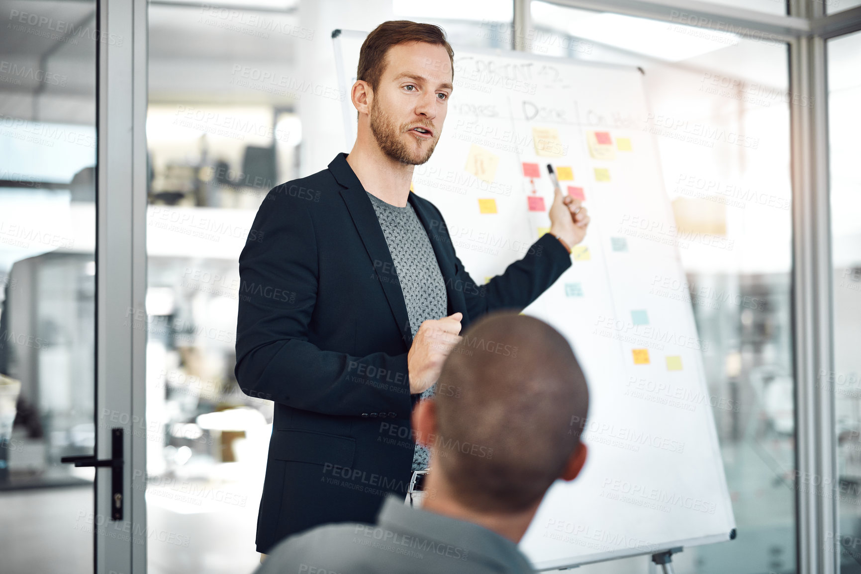 Buy stock photo Man, whiteboard and sticky notes for meeting in office, planning and boardroom for progress. Male person, mentor and speaking to staff on productivity in workplace, charts and brainstorming project