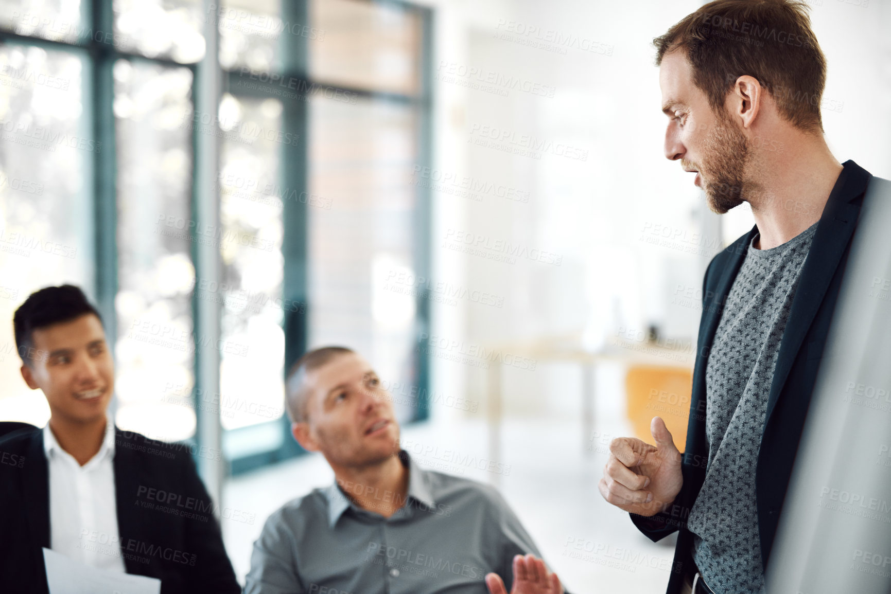 Buy stock photo Shot of businesspeople having a meeting in a boardroom