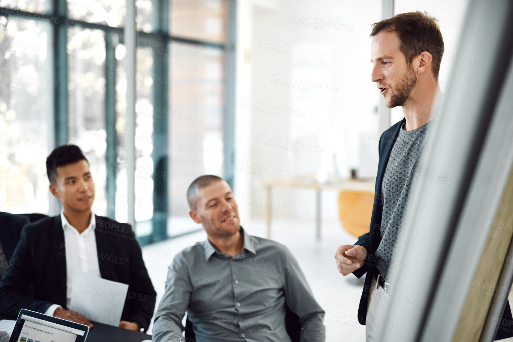 Buy stock photo Shot of businesspeople having a meeting in a boardroom