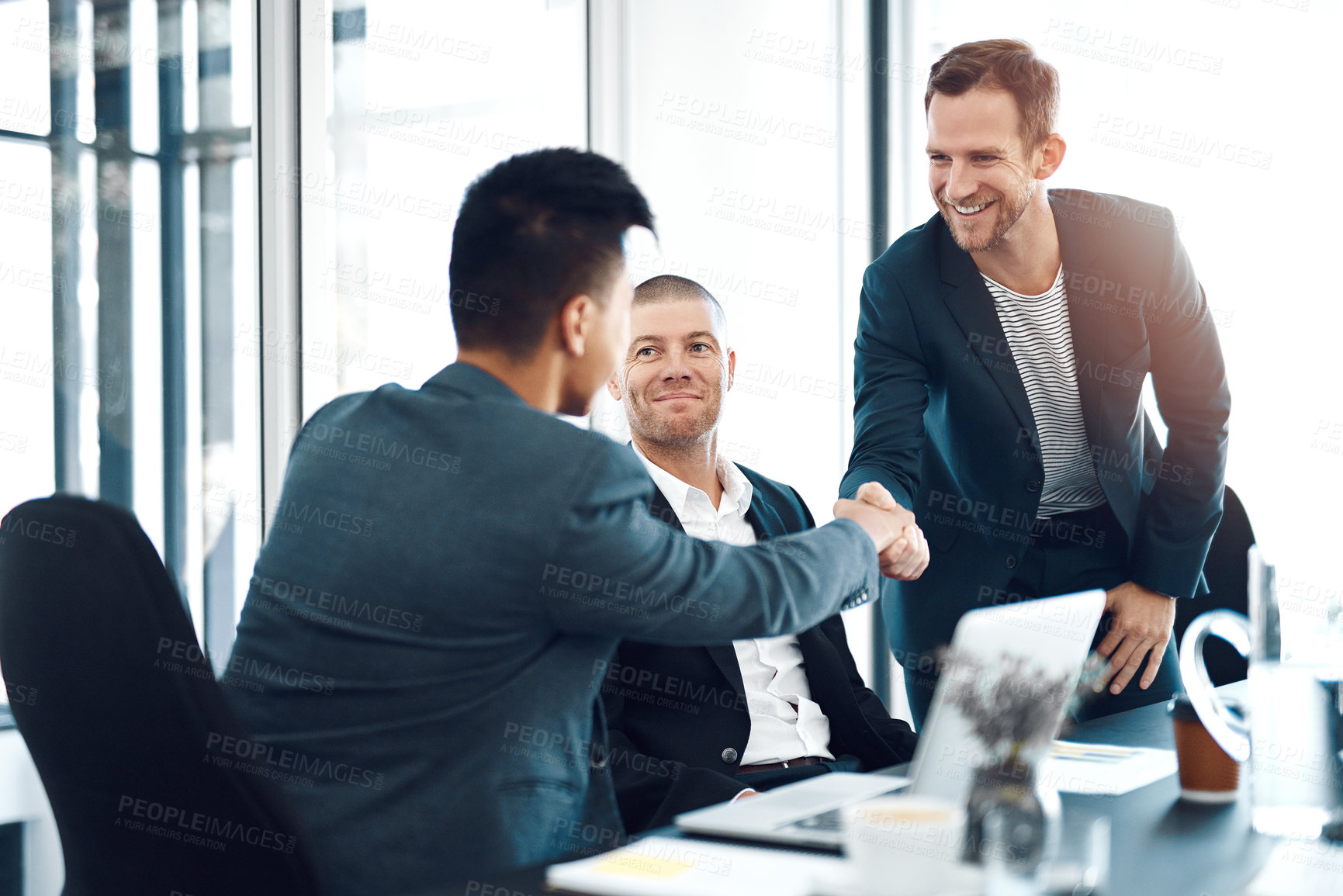 Buy stock photo Men, introduction and shaking hands in office at business meeting with smile for welcome, crm and respect. People, handshake and happy with diversity, collaboration and onboarding for job at agency