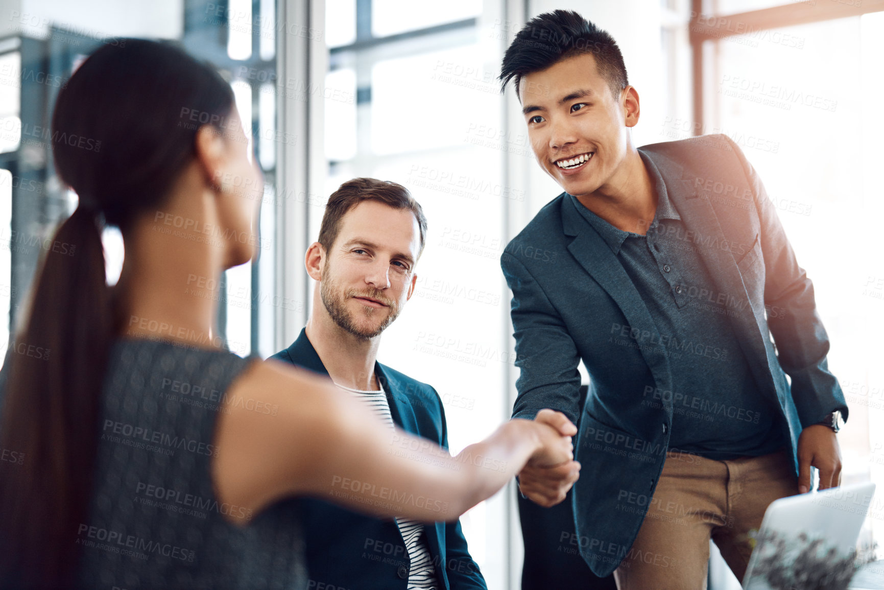 Buy stock photo Man, woman and handshake in office at meeting with smile for welcome, introduction and respect at job. Business people, shaking hands and happy with diversity, collaboration and onboarding at agency